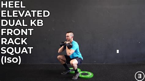 Heel Elevated Dual Kettlebell Front Rack Squat Isometric Youtube