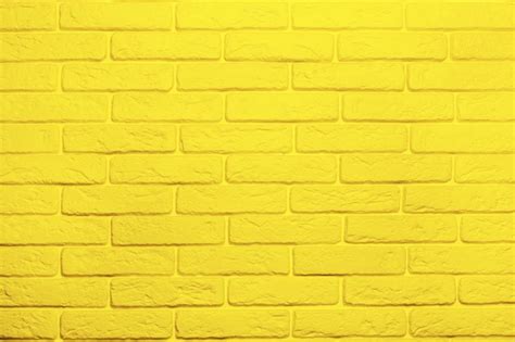 Premium Photo Yellow Brick Wall Background Trend Color 2021 Yellow