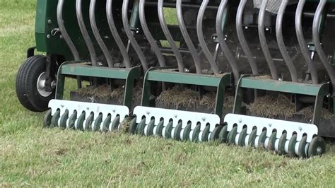 If cutting your lawn short before overseeding, bag the clippings. Sports Turf Overseeding - mechanical slit machine - YouTube