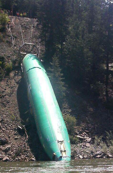 pulling boeing plane fuselages from montana river going ‘slowly
