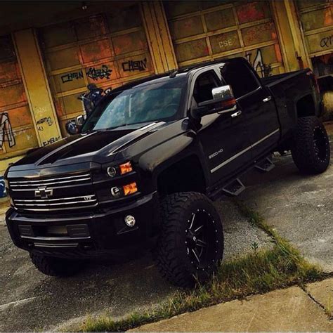 Decked Out Black Lifted Chevy Trucks