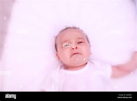 Scared Crying Baby Alone In His Crib Stock Photo Alamy