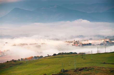 Foggy Sunny Morning In Mountain Village Misty Hills Stock Image