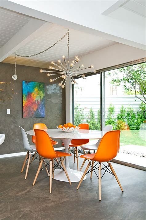 Chair wicker table and chairs room office chair diy tailgate chairs industrial dining chairs swivel armchair eames chair living room. The Bloom that Doesn't Fade: Saarinen's Tulip Table and ...