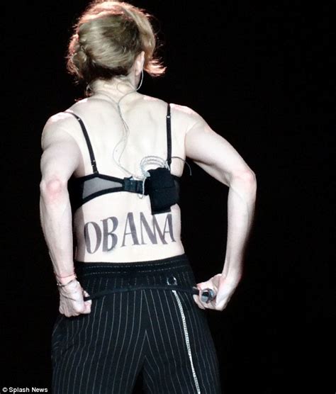 madonna backs obama with a huge temporary tattoo of his name daily mail online