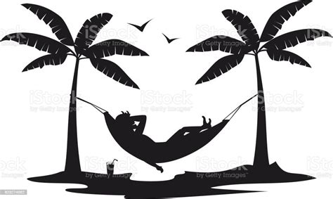Person Relaxing Lying In Hammock On The Beach Under Palm Trees