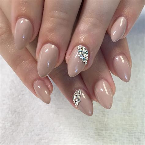 Short Nude Almond Nails With Swarovski Crystal Bling Accents Nail Art