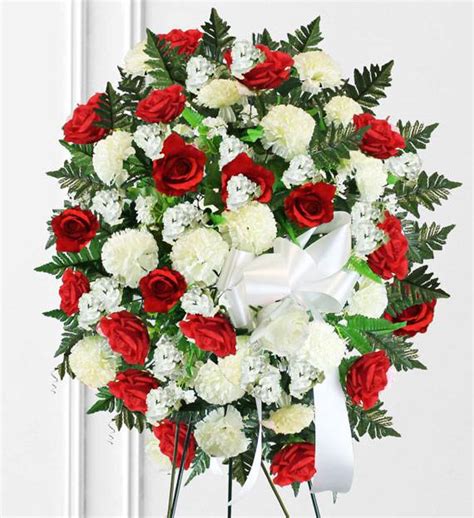Supplying only the best quality seasonal blooms, expertly crafted by our experienced design team. Red & White Sympathy Spray | Funeral Flowers Philippines
