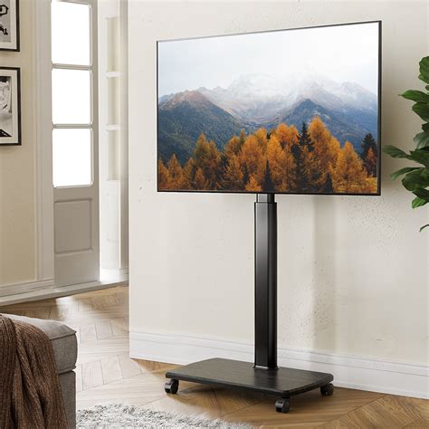 Buy Fitueyes Universal Floor Tv Stand Cart With Swivel Mount Height