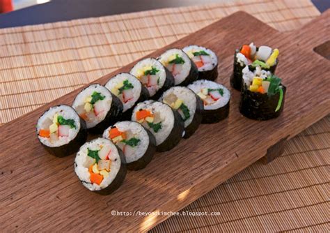 Set a sheet of nori on top of it. Korean Recipes Kimbap, Korean Seaweed Rice Rolls and ...
