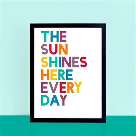 The Sun Shines Here Every Day Art Print In Black Frame On Green Table