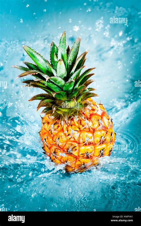 Fresh Pineapple In Water Splashes Stock Photo Alamy