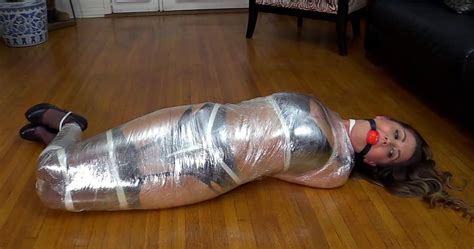 Captive Chrissy Marie Tightly Bound With Rope Mummification Bondage The Housewarming Gift