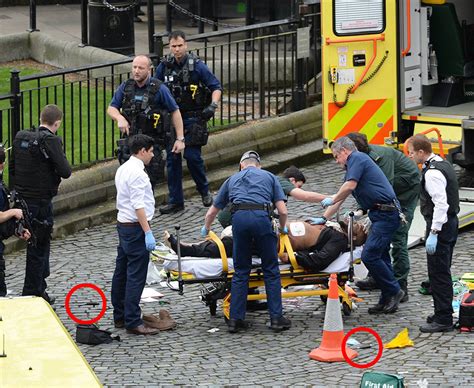 First responders attend to a person injured in the terrorist attack on london bridge. London Terror Attack: Parliament terrorist described by ...