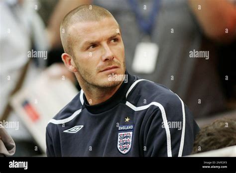 Englands Substitute David Beckham Looks Out From The Dug Out Before