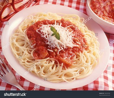 Serve over spaghetti noodles and add grated parmesan cheese as desired. Spaghetti Tomato Sauce Trimmed Cheese Stock Photo 34543336 ...