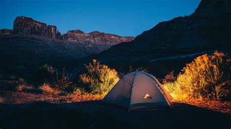 Download Wallpaper 2048x1152 Tent Camping Mountains Sunset Ultrawide