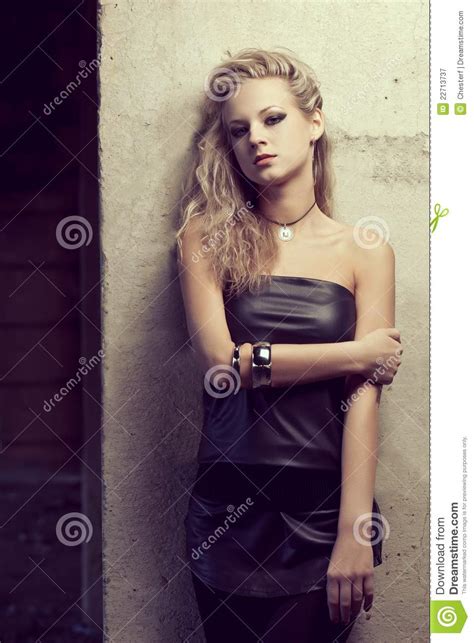Blond Woman Near Column Looking At Camera Stock Image Image Of Beauty Glamour 22713737