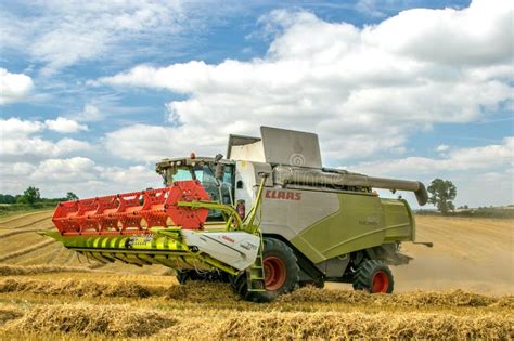 Modern Claas Combine Harvester With Header Up Cutting Crops Editorial