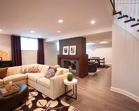 Contemporary Basement Remodel With Double Fireplace