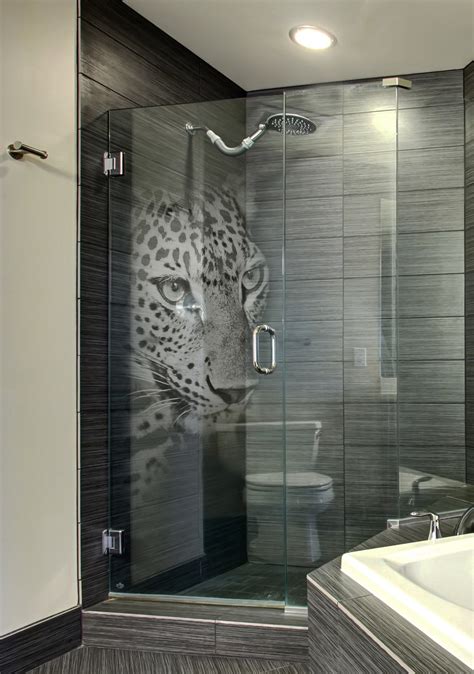 custom etched glass shower door with panther 3d laser design by glassarium