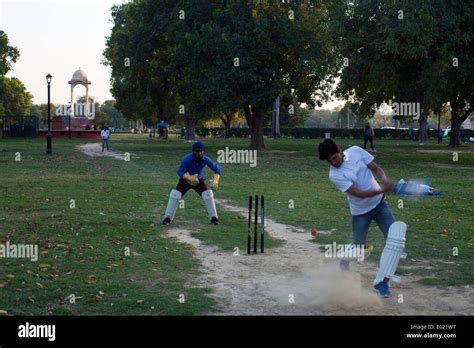 Boys Play Cricket In The Park At India Gate New Delhi India Stock