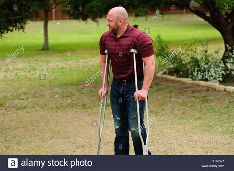 Man On Crutches High Resolution Stock Photography And Images Alamy