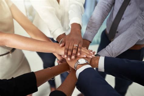 Team Huddle Hands Stock Photos Pictures And Royalty Free Images Istock