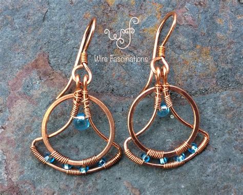 These Handmade Copper Earrings Are Fan And Circle Frames Wire Wrapped