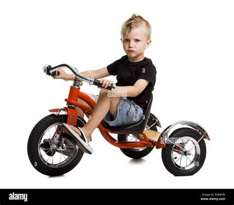Boy On Tricycle Stock Photo Alamy
