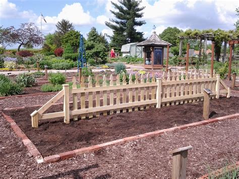 The picket fence is a great divider. A decorative picket fence I built for the Herb Garden at the Demonstration Gardens in Nathaniel ...