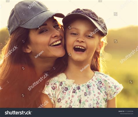 Happy Enjoying Mother Hugging Her Laughing Stock Photo 1112049596