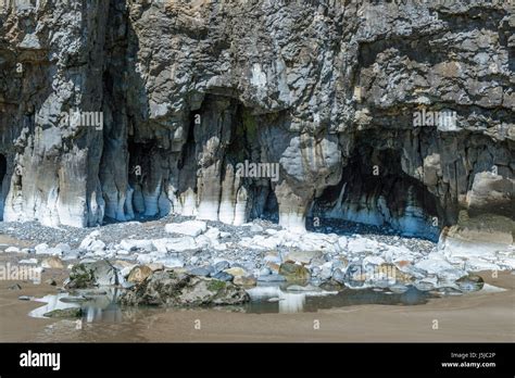 Limestone Caves At Pendine Sands Carmarthenshire South Wales Stock
