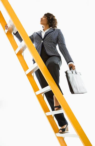 Business Woman Climbing Stairs