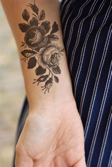 Large Black Ink Vintage Rose Flowers Tattoo On Wrist Tattooimagesbiz