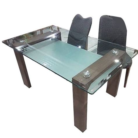 To seat four to six people, look for a table that is at least 60 long. 4 Seater Rectangular Glass Dining Table Set, Size: 4x3 ...