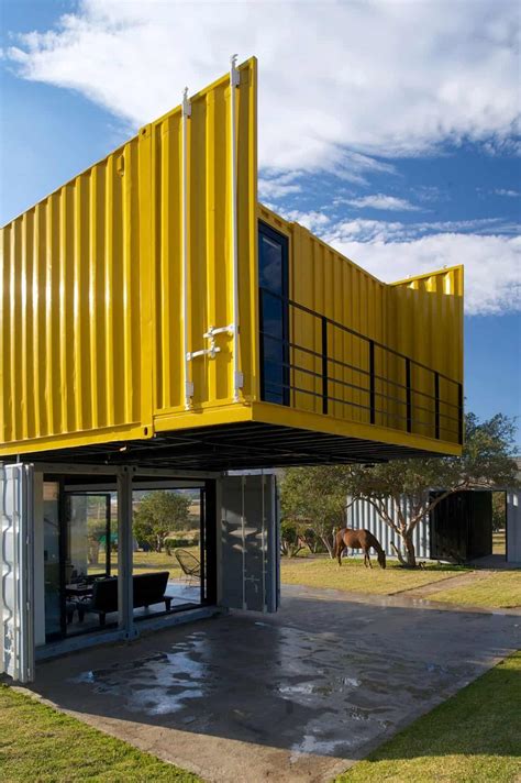 A shipping container barn becomes an elegant stable. 4 Shipping Containers Prefab plus 1 for Guests