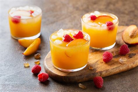 Summer Refreshing Drink Beverage Cocktail With Peach And Raspberry Stock Image Image Of