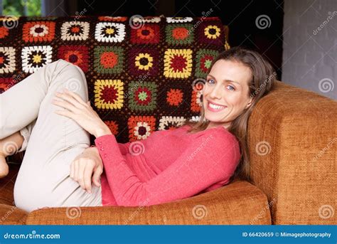 Smiling Older Woman Relaxing On Sofa Stock Image Image Of Expression