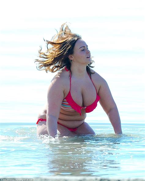 Chanelle Hayes Squeezes Her Ample Assets Into A Frilly Pink Bikini In