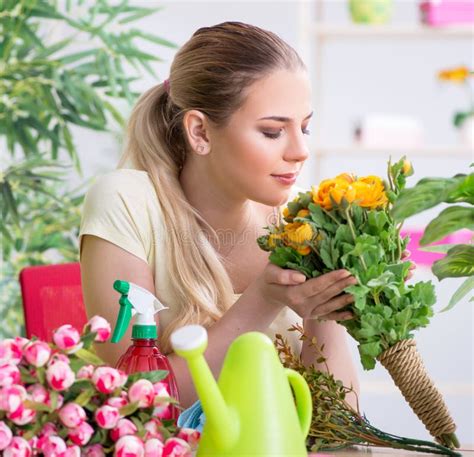 Young Woman Watering Plants In Her Garden Stock Image Image Of