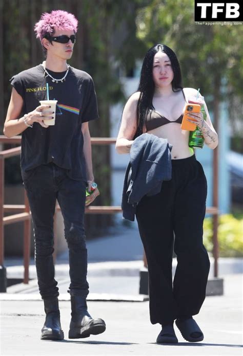 Noah Cyrus Slips Into A Bikini Top Cooling Off From The Sweltering Heat