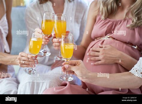 Hands Of Women Toasting Cocktail Glasses At Baby Shower Stock Photo Alamy