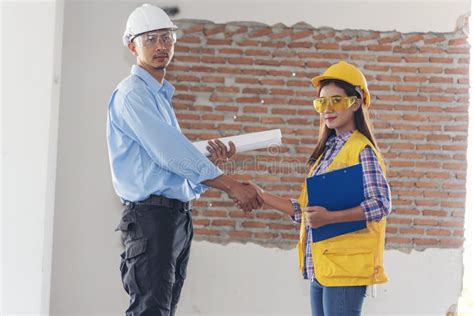 Civil Construction Engineer Teams Shaking Hands Together Wear Work