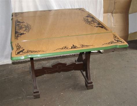 We believe this table is from the 1920's to 1940's era. Vintage Mochi porcelain/enamel top kitchen table with wood ...