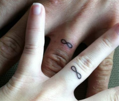 Wedding Ring Tattoos For Couples That Convey Their Love Ring Finger Tattoos Finger Tattoos