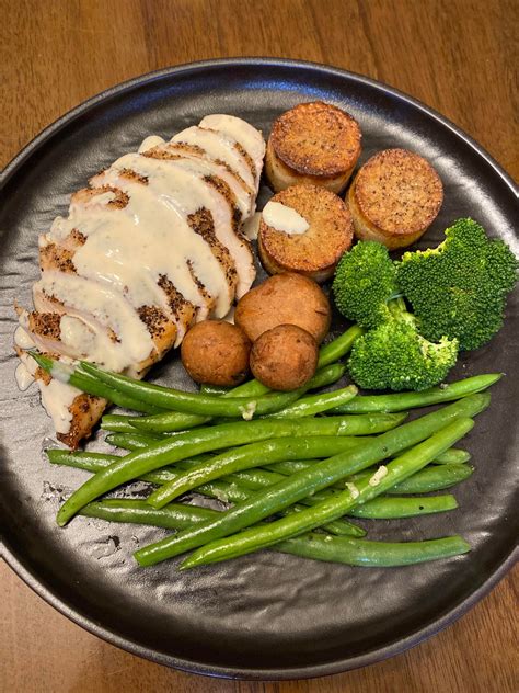 Chicken Au Poivre With Fondant Potatoes Steamed Mushrooms And Broccoli