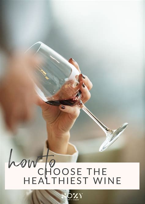 a woman holding a wine glass with the words how to choose the healthest wine