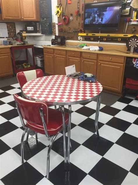 Carpets and flooring vinyl & laminate floors. Man cave in a garage. Black & white checkerboard and red checkerboard table top give a crisp yet ...