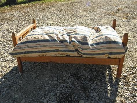 Whether you want to add new life into your old bed that has lost its cushioning or you are unhappy with the the feathers may shift and poke through sometimes. vintage wooden doll bed w/ old red & blue striped ticking ...